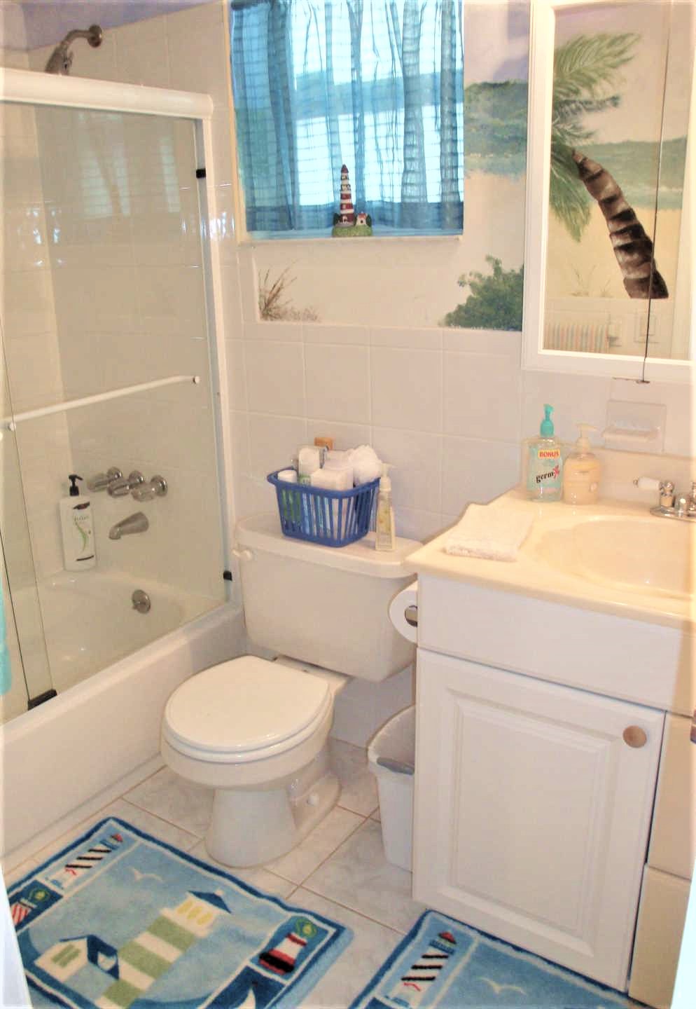 Master bath has combination tub and shower.